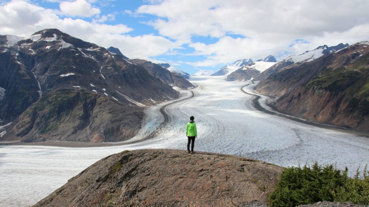 A person standing in front of Salmon Glacier