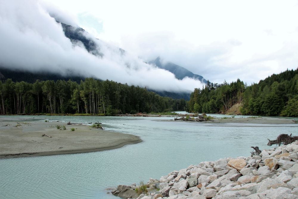 Cloud covered mountains and Bella Coola River