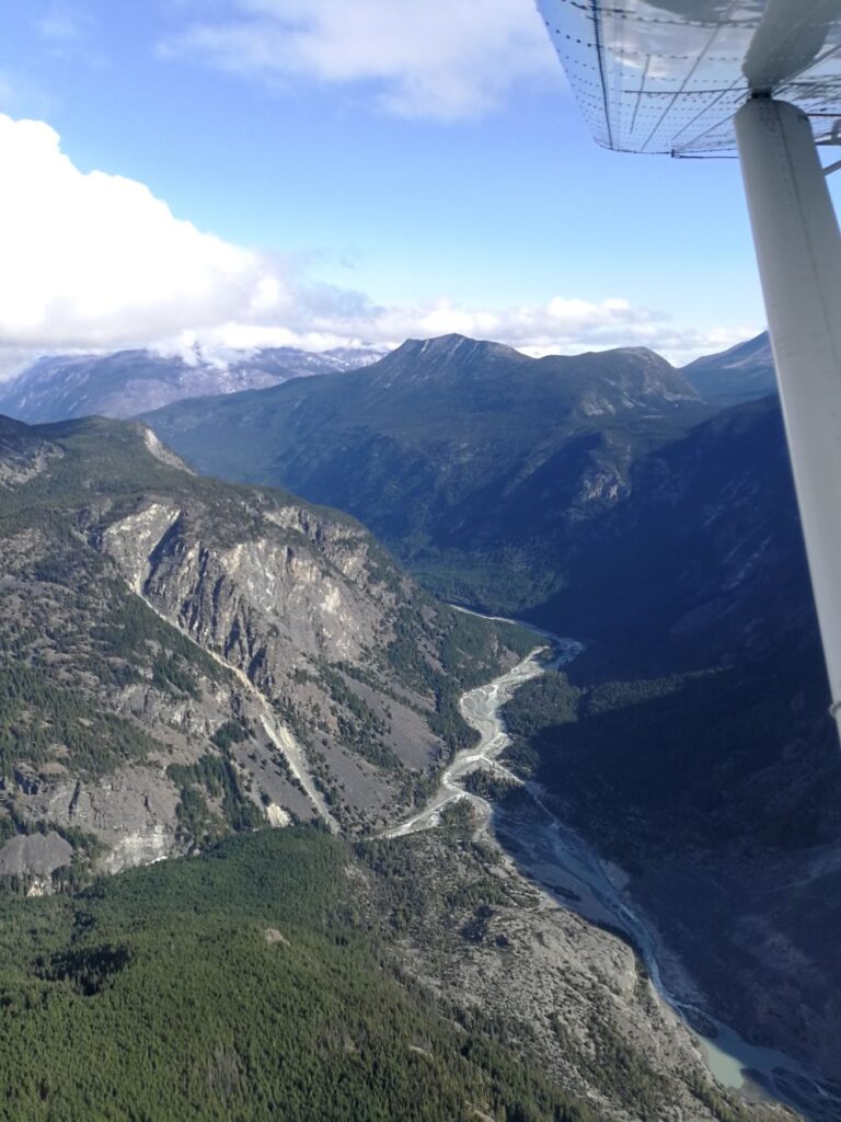 Looking down at Antarko River winding through the mountains from the floatplane